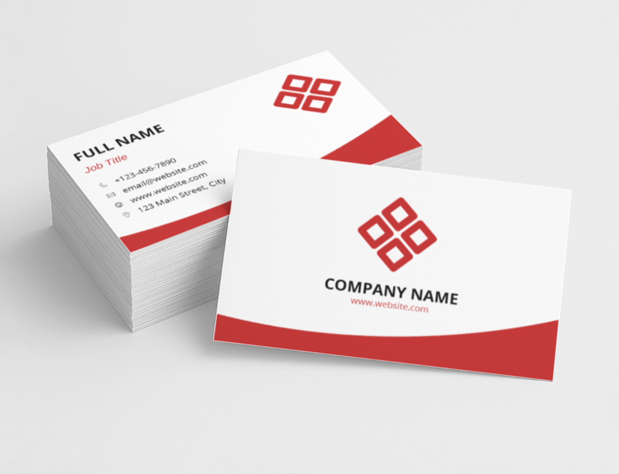 Stack of business cards with red and white design on a light gray background