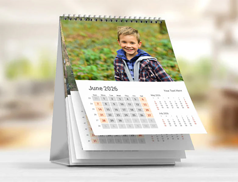 Custom 15 × 20 cm vertical photo desk calendar with photos, flip-style -  spiral-bound, standing on an office desk