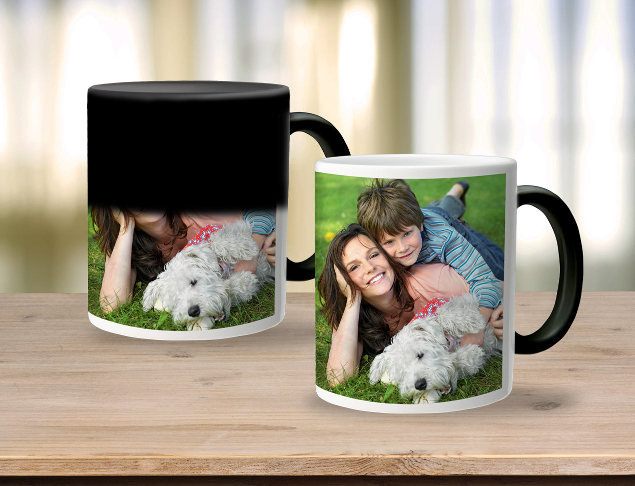 Personalised Magic Mug. One mug half black showing magic effect and one mug revealing whole picture