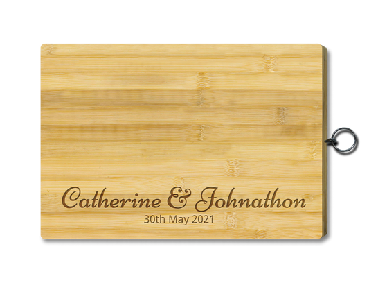Couple design engraved on cutting board