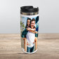 A custom stainless steel thermal mug with a custom photo print of two people on it, placed on a wooden surface.