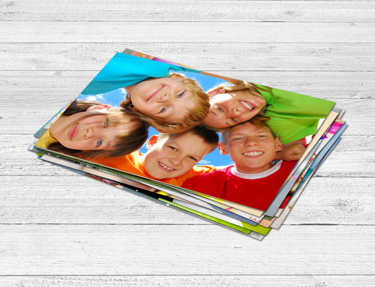 Stack of AU standard size 4x6 photo print. Order Photo Prints Online. Printed on photographic paper for best quality at inexpensive prices. Cheap photos printed.